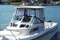 Photo of Grady White Explorer 244, 1994: Hard-Top, Visor, Side Curtains, Aft-Drop-Curtain, viewed from Port Front 