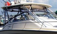 Photo of Grady White Express 330, 2007 Front Visor, Side Curtains, Aft-Drop-Curtain Sunbrella Fabric, viewed from Starboard Front 