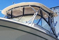 Photo of Grady White Freedom 285, 2014: Hard-Top, Front Visor, Side Curtains, viewed from Port Front 