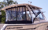 Photo of Grady White Freedom 307, 2013: Factory Hard-Top, Side Curtains, Aft-Drop-Curtain Black Sunbrella, viewed from Starboard Rear 