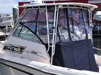 Photo of Grady White Sailfish 272, 2000: Hard-Top, Visor, Side Curtains, Aft-Drop-Curtain, viewed from Port Rear 