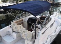 Photo of Grady White Voyager 248, 1997: Bimini Top Top, viewed from Starboard Rear 