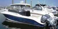 Photo of Hydrasports 3300VX, 2007: Factory Hard-Top, Front Spray-Shield, Side Curtains, Aft Curtain, viewed from Port Rear 