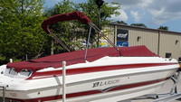 Photo of LARSON LXI 248, 2007: Bimini Top in Boot, Bow Cover Cockpit Cover, viewed from Starboard Rear 