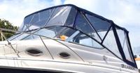 Photo of Larson Cabrio 240, 2006: Bimini Top, Front Connector, Side Curtains, Camper Top, Camper Side and Aft Curtains, viewed from Port Front 