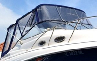 Photo of Larson Cabrio 240, 2006: Bimini Top, Front Connector, Side Curtains, Camper Top, Camper Side and Aft Curtains, viewed from Starboard Front 