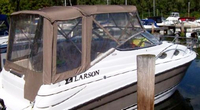 Photo of Larson Cabrio 240, 2006: Bimini Top, Front Connector, Side Curtains, Camper Top, Camper Side and Aft Curtains, viewed from Starboard Rear 