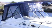 Photo of Larson Cabrio 240, 2008: Bimini Top, Front Connector, Side Curtains, Camper Top, Camper Side and Aft Curtains, viewed from Starboard Front 