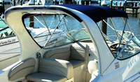 Photo of Larson Cabrio 260 Arch, 2008: Bimini Top, Arch Aft Curtain Connection Track, viewed from Starboard Rear 