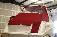 Photo of Larson Cabrio 290, 1998: Bimini Top, Front Connector, Side Curtains, Aft-Drop-Curtain, Rear, viewed from Starboard 
