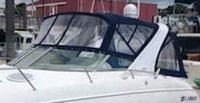 Photo of Larson Cabrio 310, 2006: Bimini Top, Front Connector, Side Curtains, Camper Top, Camper Side Curtains, viewed from Port Front 