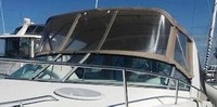 Photo of Larson Cabrio 310, 2006: Bimini Top, Front Connector, Side Curtains, viewed from Port Front 