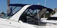 Photo of Larson Cabrio 310, 2007: Bimini Top, Camper Top, viewed from Port Rear 