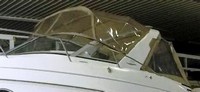 Photo of Larson Cabrio 330, 2000: Arch Bimini Top, Connector, Side Curtains, Camper Top, Camper Side and Aft Curtains, viewed from Port Front 