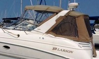 Photo of Larson Cabrio 330, 2000: Arch Bimini Top, Connector, Side Curtains, Camper Top, Camper Side and Aft Curtains, viewed from Port Rear 