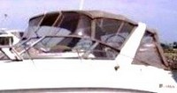 Photo of Larson Cabrio 330, 2005: Factory Arch Bimini Top, Bimini Connector, Side Curtains, Camper Top, Camper Side Curtains, Camper Aft Curtain, viewed from Port Front 