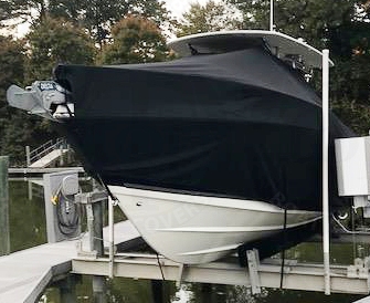 Mako 284CC HIGH Bow Rails, 20xx, TTopCovers™ T-Top boat cover On Lift, port front
