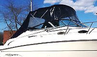 Photo of Monterey 242 Cruiser, 1999: Bimini Top, Front Visor, Side Curtains, Aft Curtain, viewed from Starboard Front 