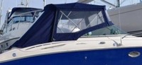 Photo of Monterey 248 LSC Montura Cuddy, 2005: Bimini Top, Front Connector, Side and Aft Curtains, viewed from Starboard Side 