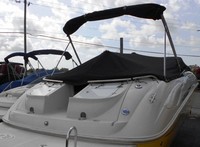 Photo of Monterey 263 Explorer, 2005: Bimini Top in Boot, Bow Cover Cockpit Cover, viewed from Starboard Rear 
