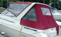 Photo of Monterey 296 Cruiser Arch, 1999: Bimini Top, Front Visor, Side Curtains, Arch Aft Curtain Burgundy Sunbrella, viewed from Port Rear 