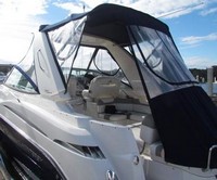 Photo of Monterey 320 Sport Yacht, 2009: Hard-Top, Front Visor, Side Curtains with optional U Zip windows Camper Top, Camper Side and Aft Curtains, Inside, viewed from Port Rear 