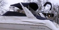 Photo of Monterey 322 Cruiser, 2003: Bimini Top, Arch-Aft-Top, Camper Top in Boot, Cockpit Cover, viewed from Port Side 
