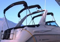 Photo of Monterey 322 Cruiser, 2006: Bimini Top in Boot Arch-Aft-Top in Boot, Camper Top in Boot, viewed from Starboard Rear 