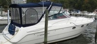 Photo of Monterey 322 Cruiser, 2006: Bimini Top, Connector, Side Curtains, Arch-Aft-Top, Camper Top, Camper Side and Aft Curtains, viewed from Starboard Rear 