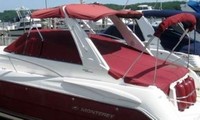 Photo of Monterey 322 Cruiser, 2006: Bimini Top, Front Connector Arch-Aft-Top, Camper Top in Boot, Cockpit Cover, viewed from Port Rear 