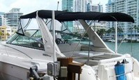 Photo of Monterey 322 Cruiser, 2006: Bimini Top, Front Connector Arch-Aft-Top, Camper Top, viewed from Port Rear 