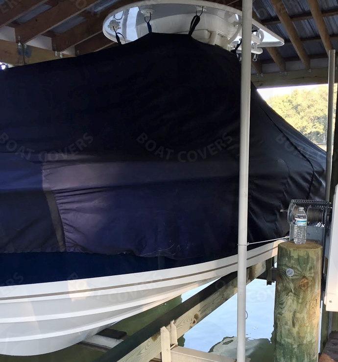 Pursuitt C 238, 20xx, TTopCovers™ T-Top boat cover On Lift, port front