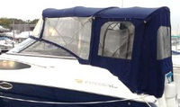 Photo of Regal 2565 Window Express, 2009: Bimini Top, Front Visor, Side Curtains, Camper Top, Camper Side and Aft Curtain, viewed from Port Rear 