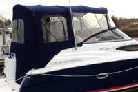 Photo of Regal 2565 Window Express, 2009: Bimini Top, Front Visor, Side Curtains, Camper Top, Camper Side and Aft Curtain, viewed from Starboard Rear 