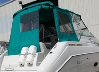 Photo of Regal Commodore 272, 1995: Bimini Top, Visor, Side Curtains, Camper Top, Camper Side and Aft Curtains, viewed from Starboard Rear 