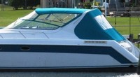Photo of Regal Commodore 400, 1994: Bimini Top, Front Visor, Side and Aft Curtains, viewed from Port Rear 