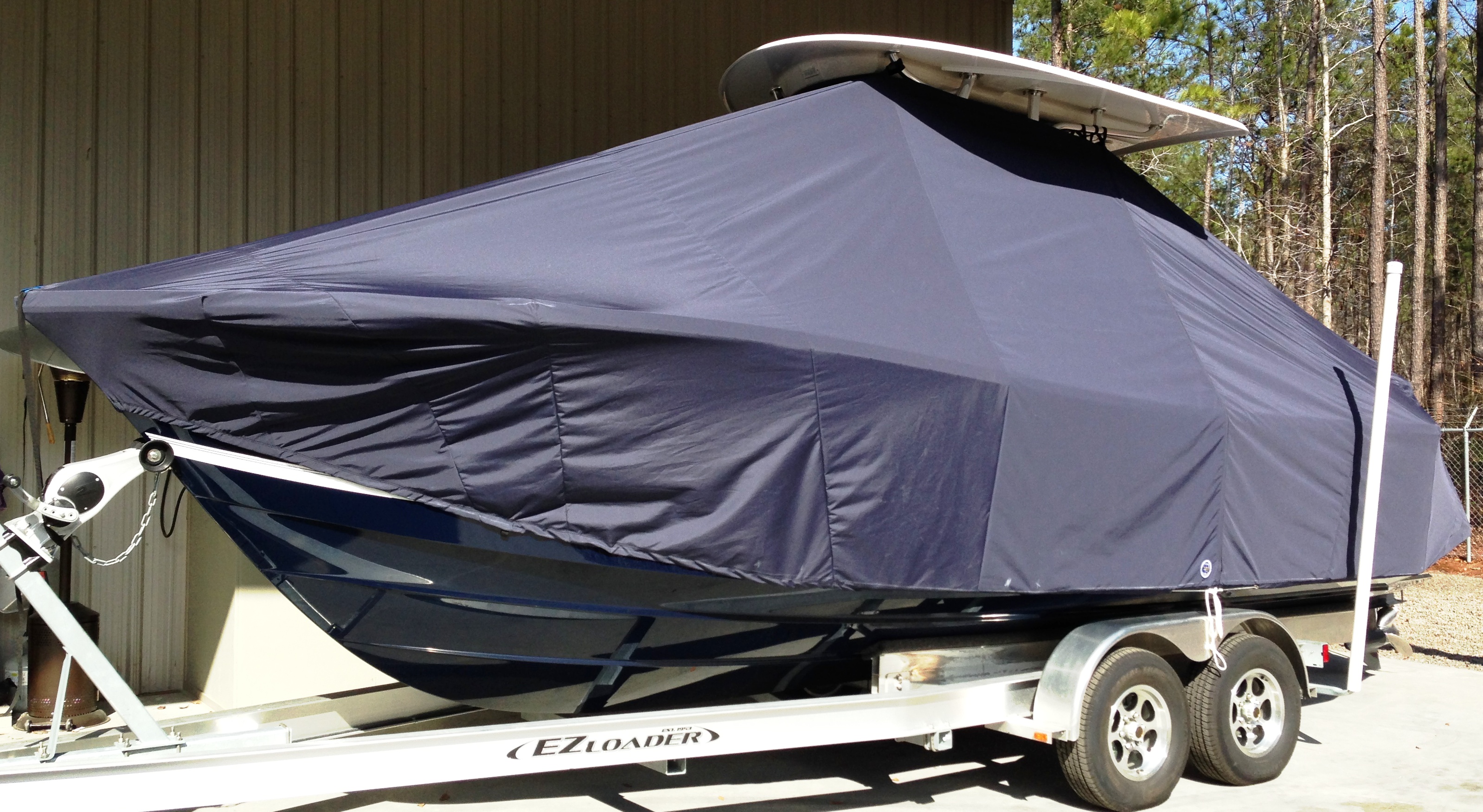 Regulator 23FS, 2013, TTopCovers™ T-Top boat cover, port front