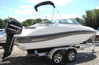 Photo of Rinker 196 Captiva OB, 2013: Bimini Top in Boot, viewed from Starboard Rear 