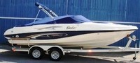 Photo of Rinker 212 Captiva Cuddy, 2005: Bimini Top in Boot, Cockpit Cover, viewed from Starboard Side 