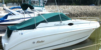 Photo of Rinker 242 Fiesta Vee, 2000: Bimini Top in Boot, Cockpit Cover, viewed from Starboard Side 