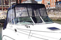 Photo of Rinker 242 Fiesta Vee, 2000: Bimini Top, Connector, Side Curtains, Aft Curtain, viewed from Starboard Front 