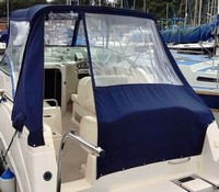 Photo of Rinker 242 Fiesta Vee, 2000: Bimini Top, Side Curtains, Aft Curtain, viewed from Port Rear 
