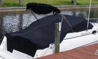 Photo of Rinker 242 Fiesta Vee, 2001: Bimini Top in Boot, Cockpit Cover, viewed from Starboard Rear 