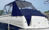Photo of Rinker 250 Express Cruiser, 2005: Factory OEM Bimini Top, Connector, Side Curtains, Aft Curtain, viewed from Port Rear 
