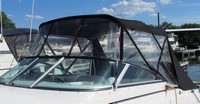 Photo of Rinker 250 Express Cruiser, 2007: Bimini Top, Front Connector Bimini Side Curtains Bimini Aft Curtain, viewed from Port Front 