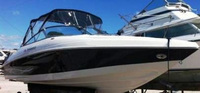 Photo of Rinker 262 Bow Rider, 2006: Factory OEM Bimini Top, Connector, Side Curtains, viewed from Starboard Front 