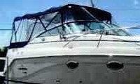 Photo of Rinker 270 Express Cruiser, 2006: Bimini Connector, Side Curtains, Aft Curtain Camper Top, Camper Side Aft Curtains, viewed from Starboard Front 