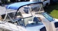 Photo of Rinker 272 Bowrider, 2001: Bimini Top, Front Connector, Side Curtains, viewed from Starboard Front, Above 