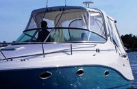Photo of Rinker 280 Express Cruiser Canvas TO Arch, 2009: Stamoid Bimini Connector, Side Curtains, Camper Side Afts Curtain, viewed from Port Front 