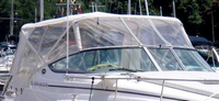 Photo of Rinker 280 Express Cruiser NO Arch, 2008: Bimini Top, Front Connector Bimini, Side and, Rear Side Curtain Sets Aft Curtains White Stamoid, viewed from Starboard Front 